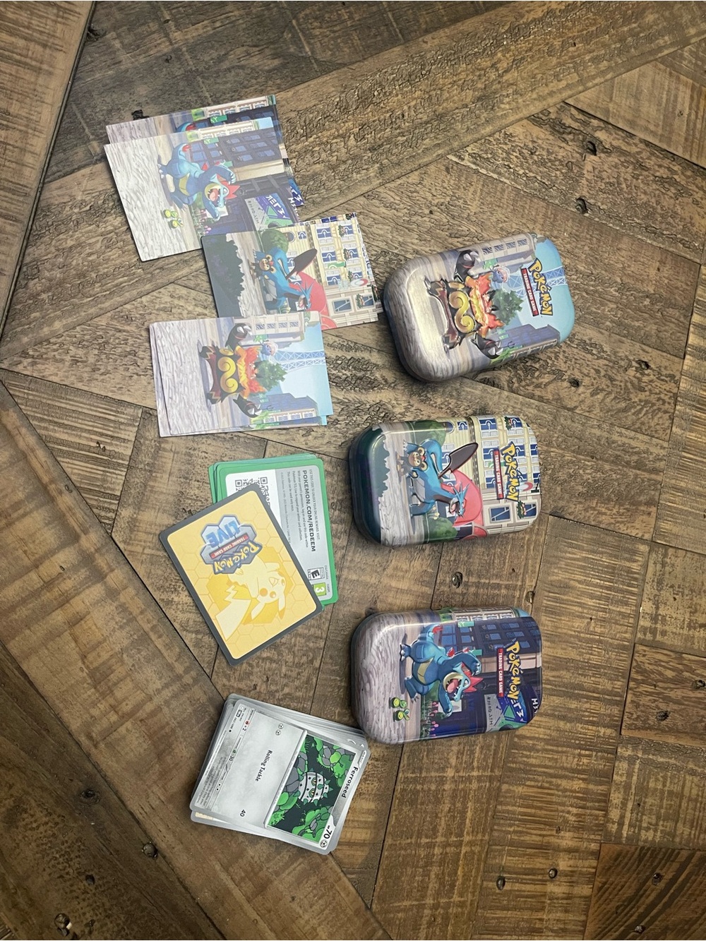 Pokémon TCG: Lumiose City Mini Tins collection (empty), bulk and code cards